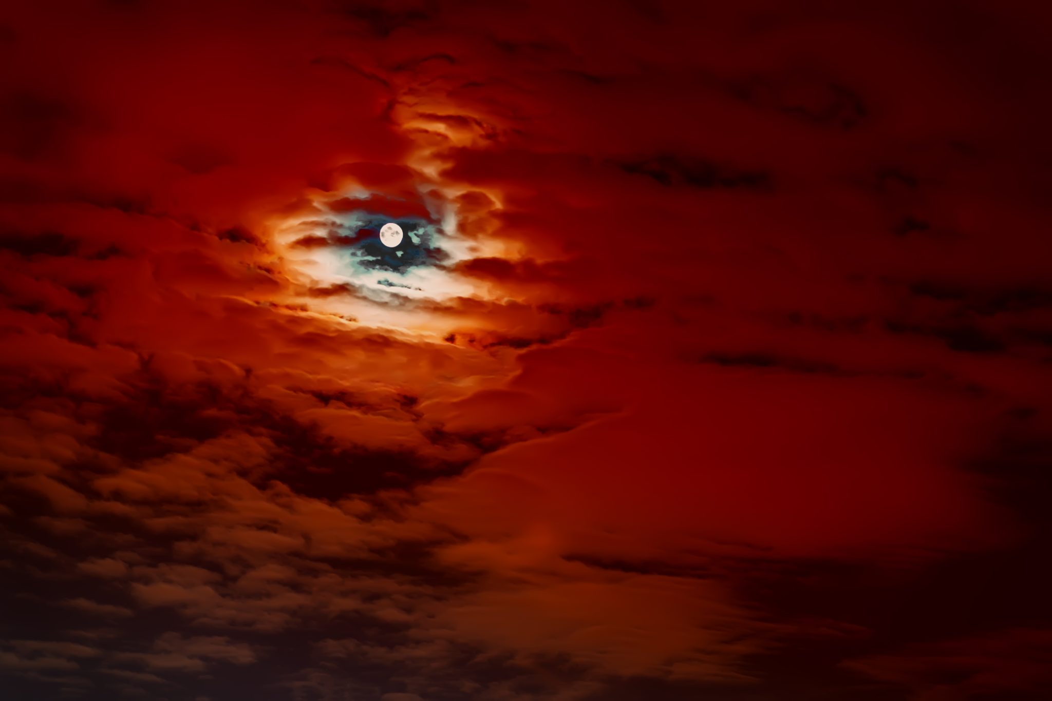 Abstract Natural scary Halloween background, full moon, dark red cloudy